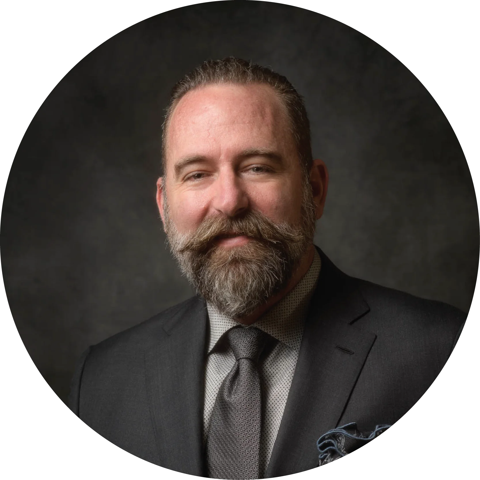 A professional portrait of Brian Egan from the NAI Alliance commercial real estate team
