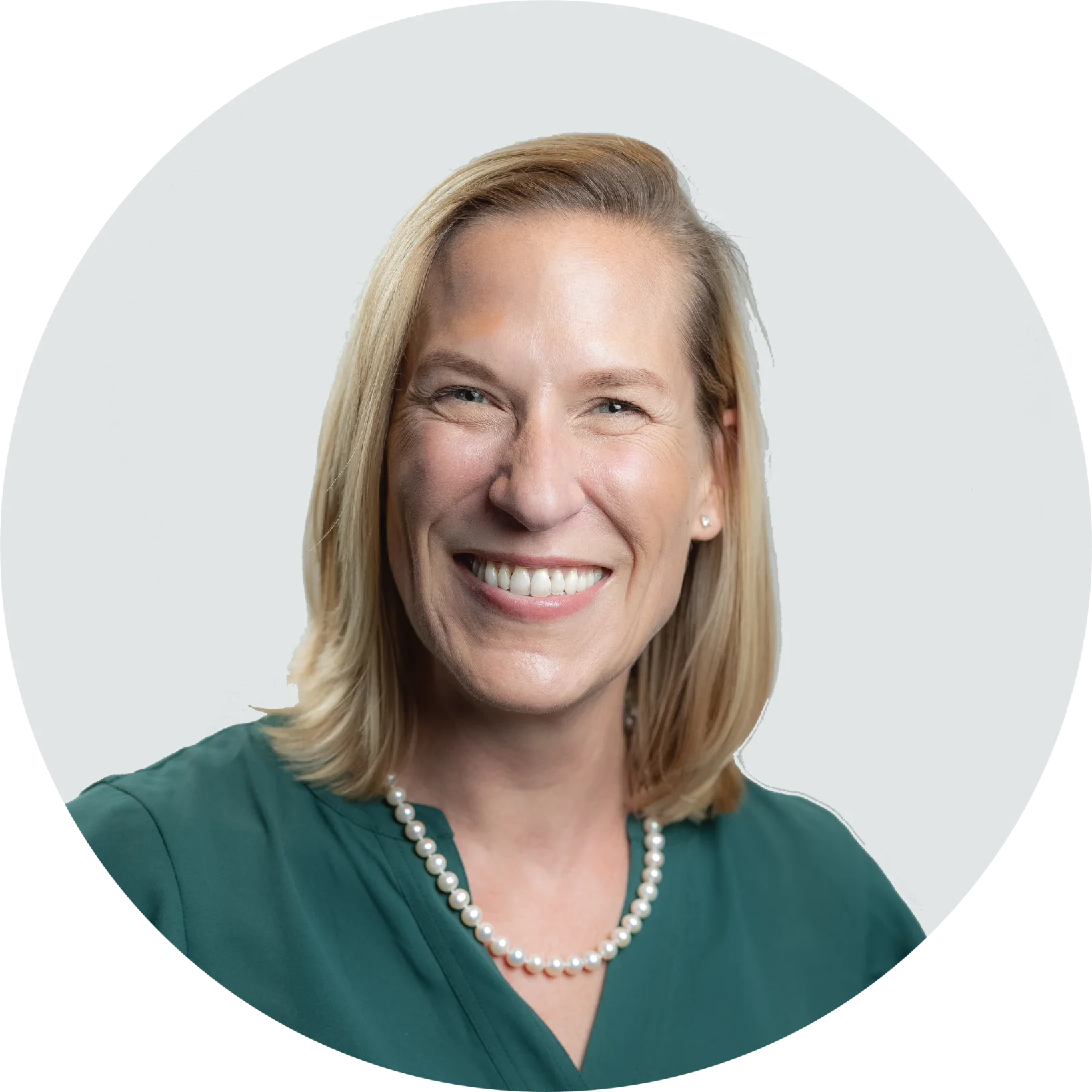 A professional portrait of Tamsen Fricke from the NAI Alliance commercial real estate team